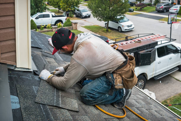 Professional Roofing technician working in Hallsville, MO